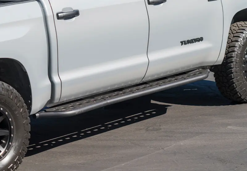 Cali Raised Rock Sliders For 2022 Toyota Tundra – Non-Hybrid, No Kick-Out Design, Raw Aluminum Fill Plate 1